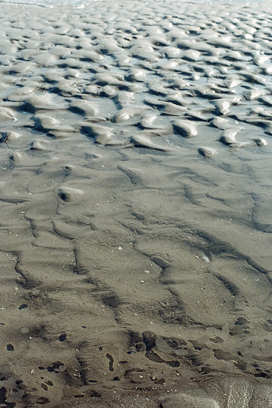 Sand und Wasser